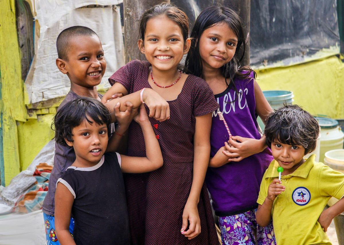 Smiling children from a disadvantaged community